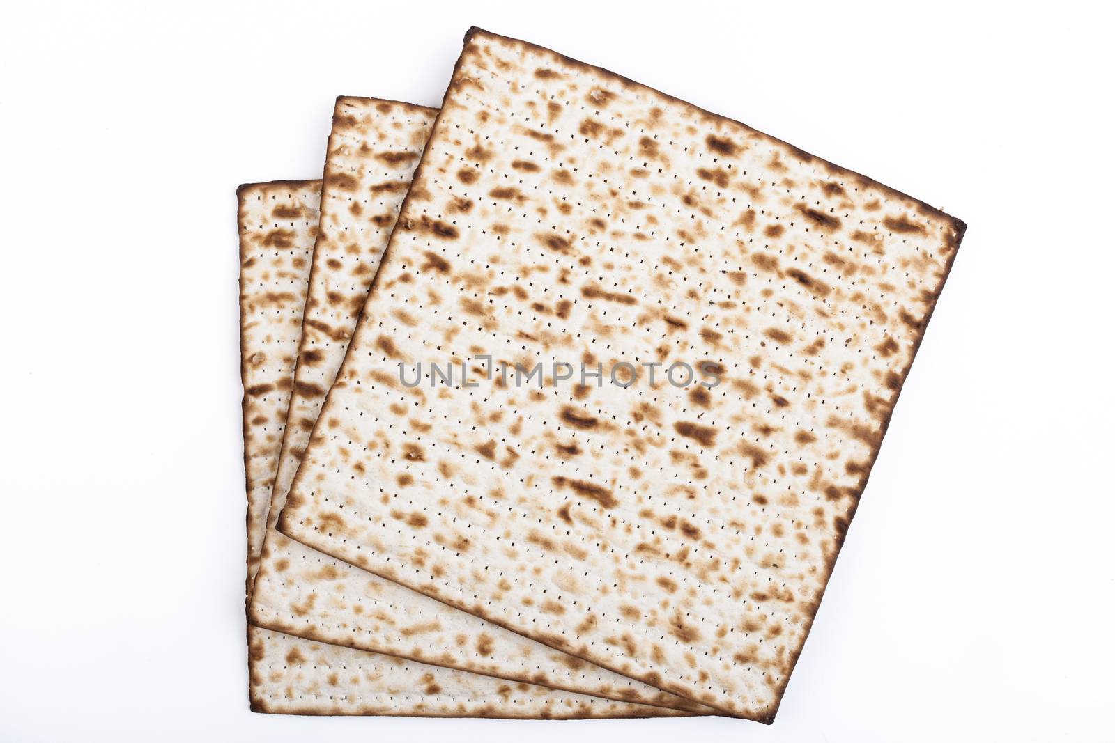 Jewish traditional Pesach textured Matza bread substitute isolated on white background