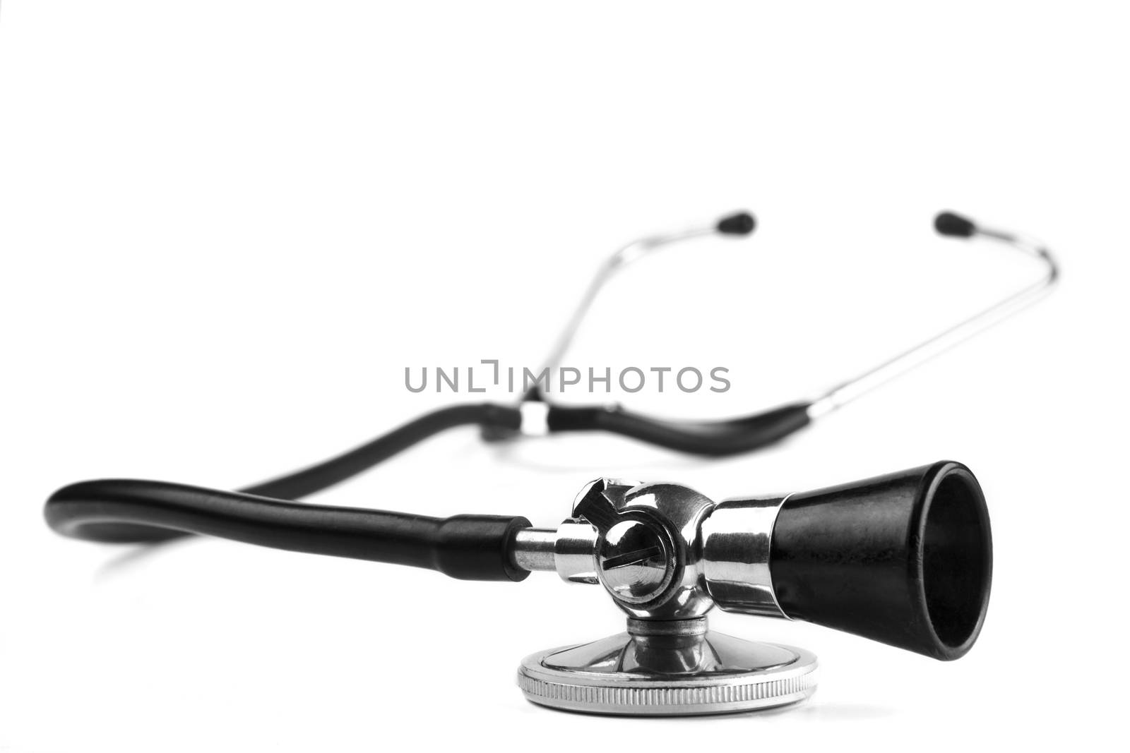 Black stethoscope  closeup isolated on white background