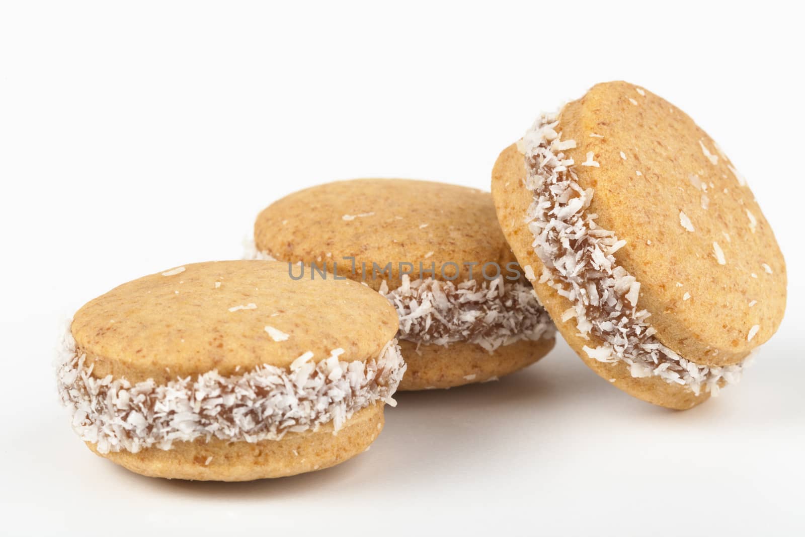 Round coconut cookies isolated on white background