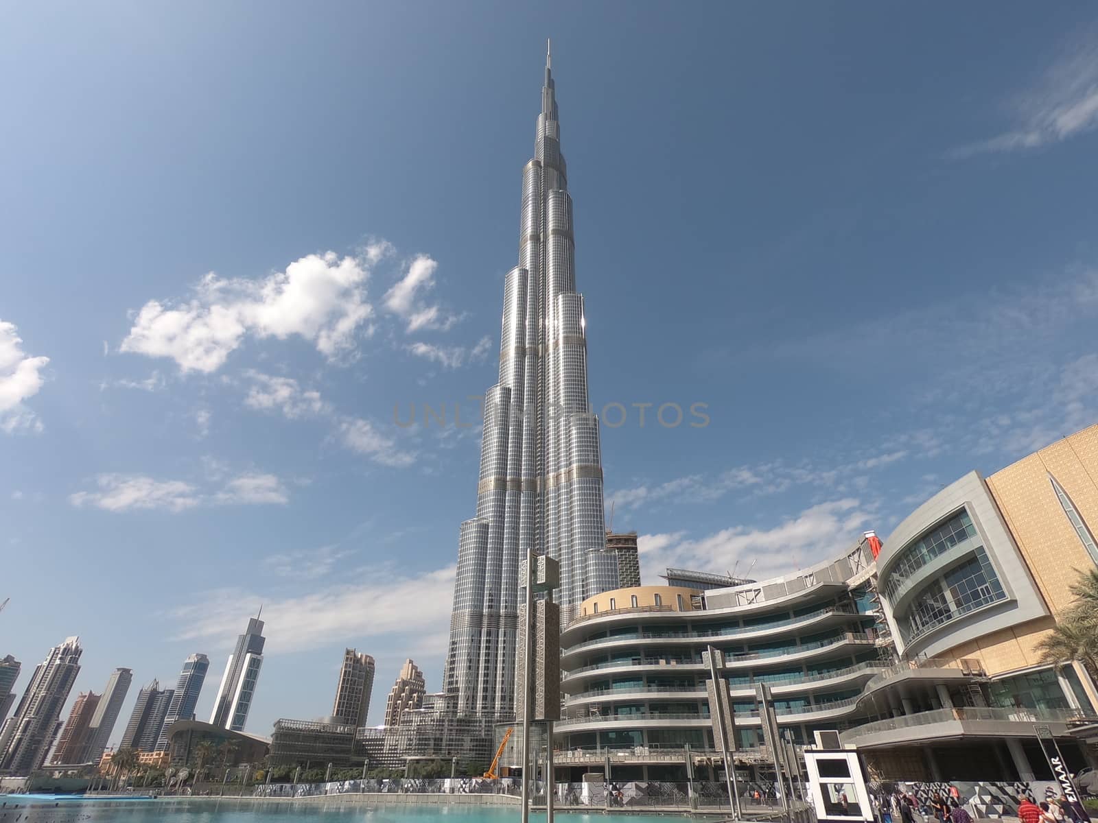 Burj Khalifa view from below in Day Time - World's Tallest Structure in Dubai UAE with a view of Dubai Mall - World's Largest Mall