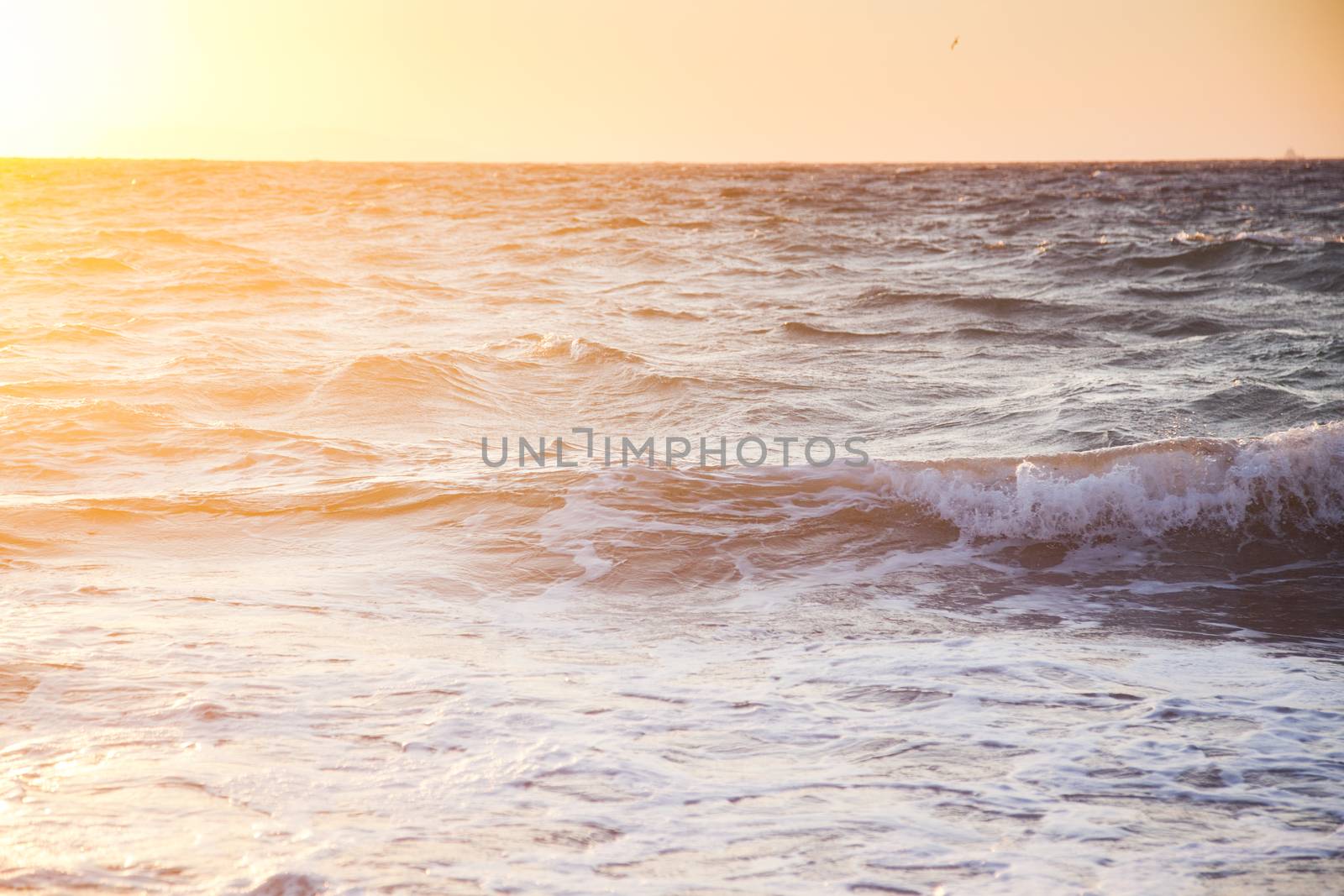 beautiful sea waves at sunset -  beach holiday background