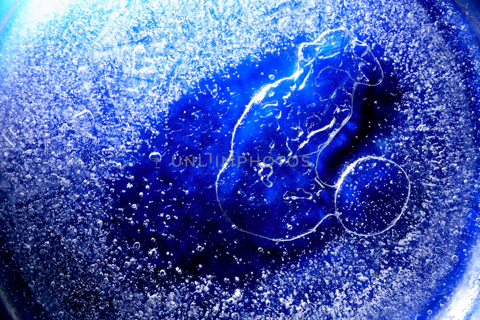 Nice abstract blue background made from water under ice