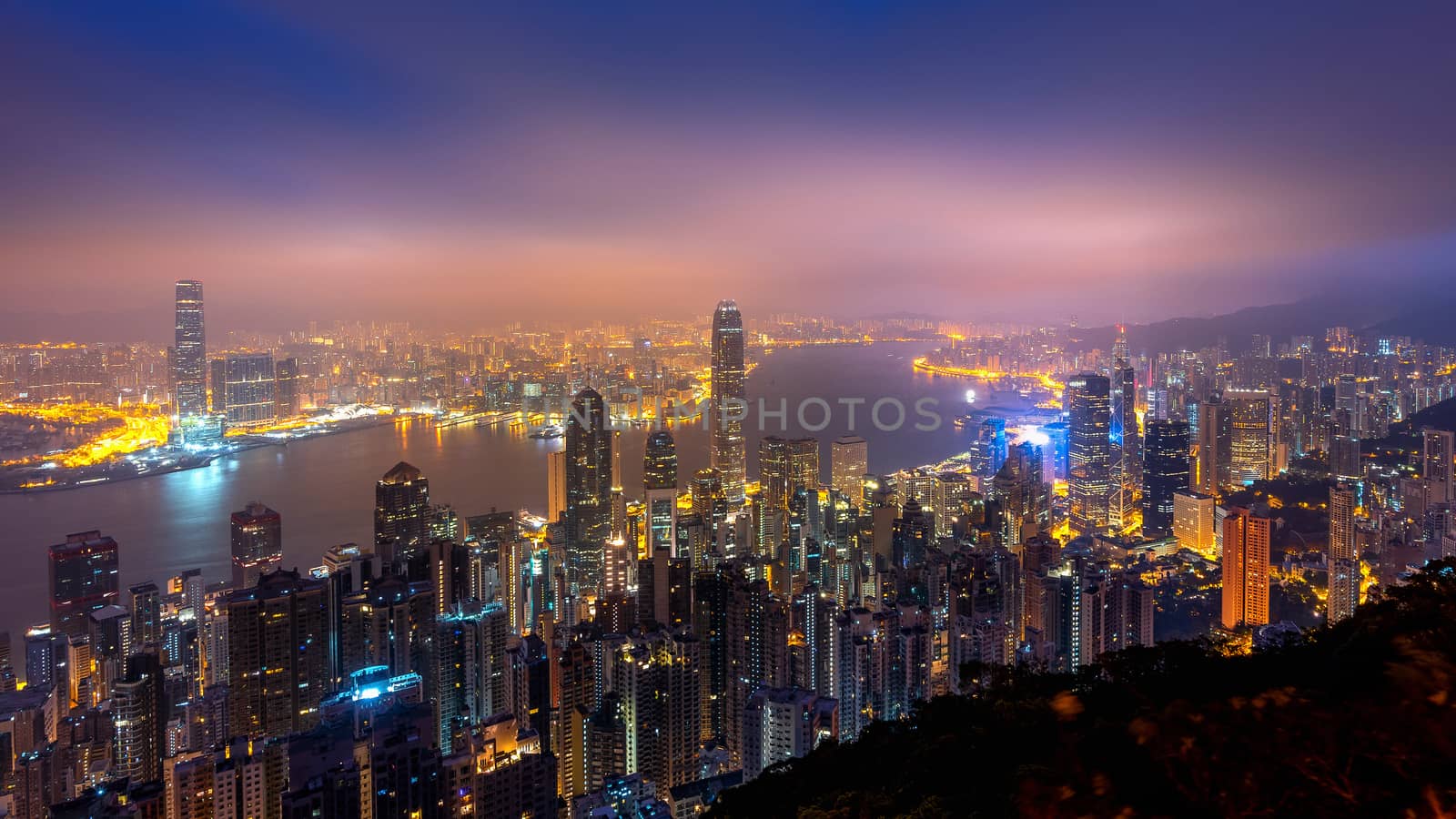 Hong Kong cityscape at night from the Victoria peak. by gutarphotoghaphy