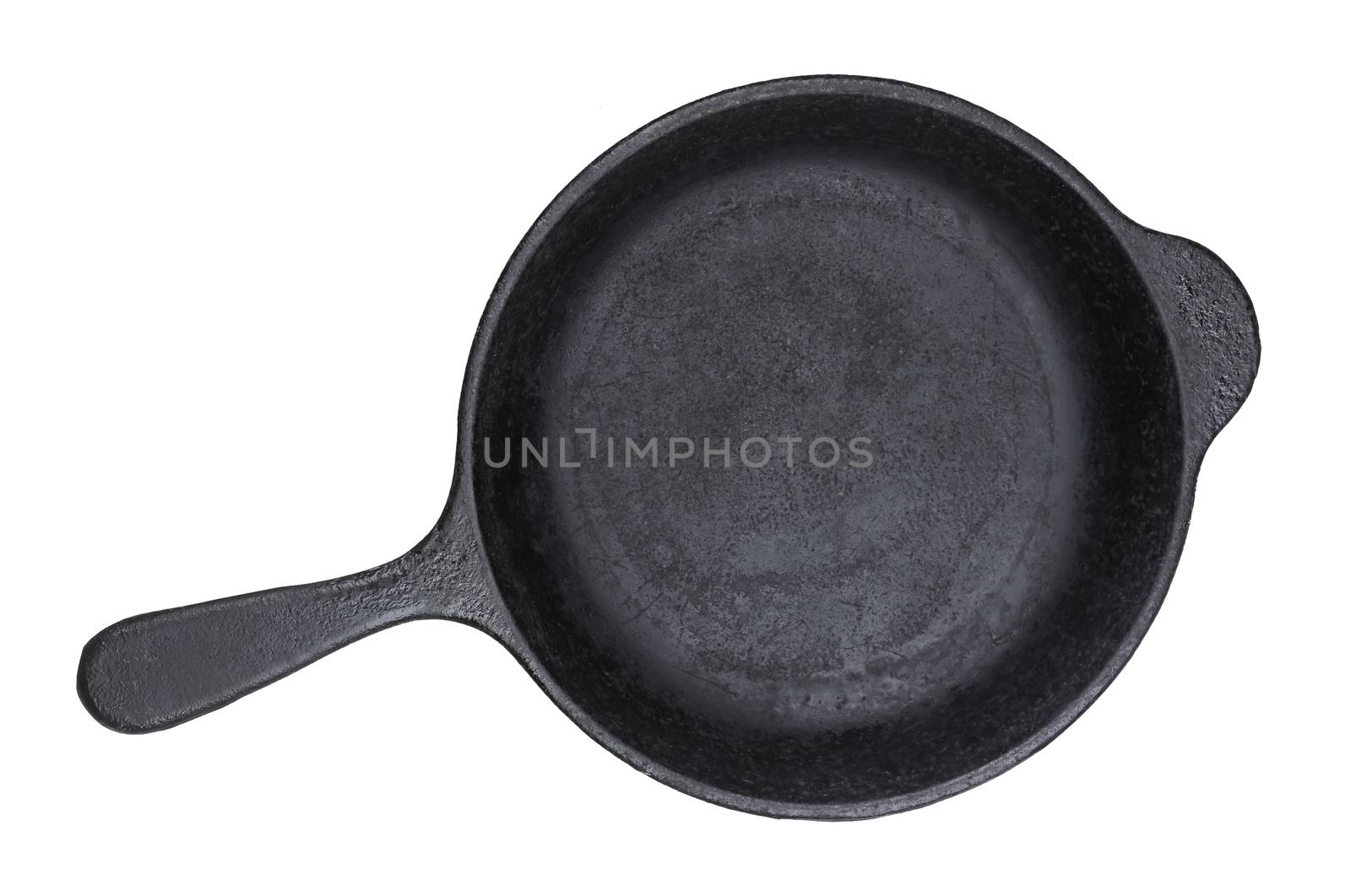 Old cast iron pan isolated on white background with clipping path, vintage empty skillet, top view