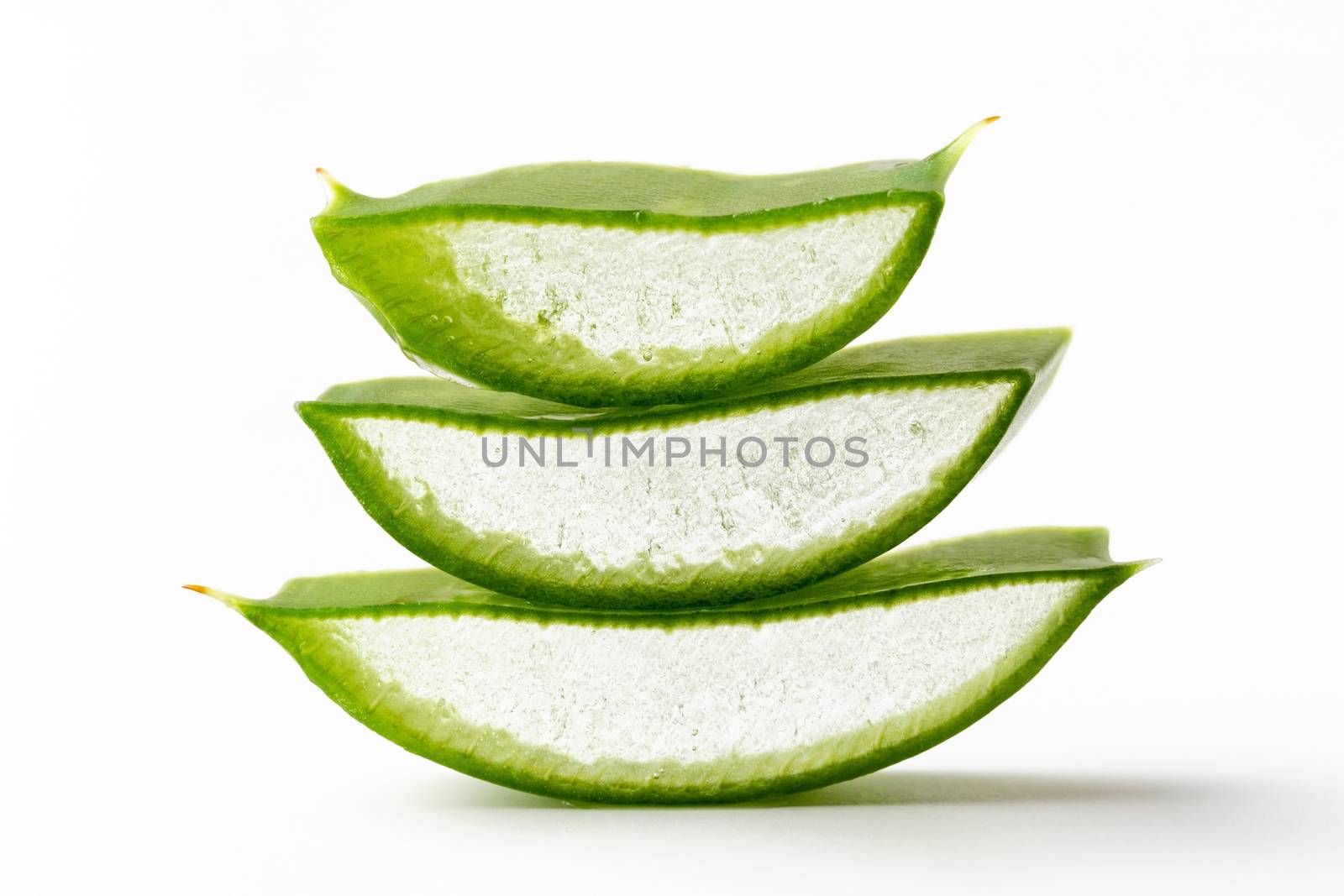 Pieces of aloe vera leaf on a white background