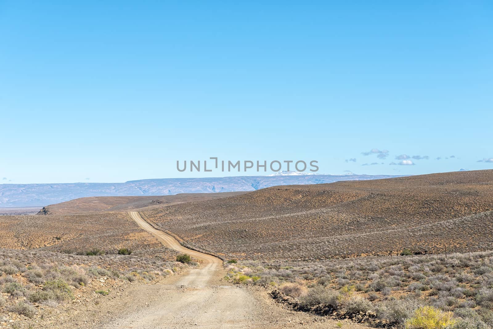 A landscape on road R356 to Ceres in the Western Cape Province. Snow is visible on Sneeuberg in the Cederberg, to the right