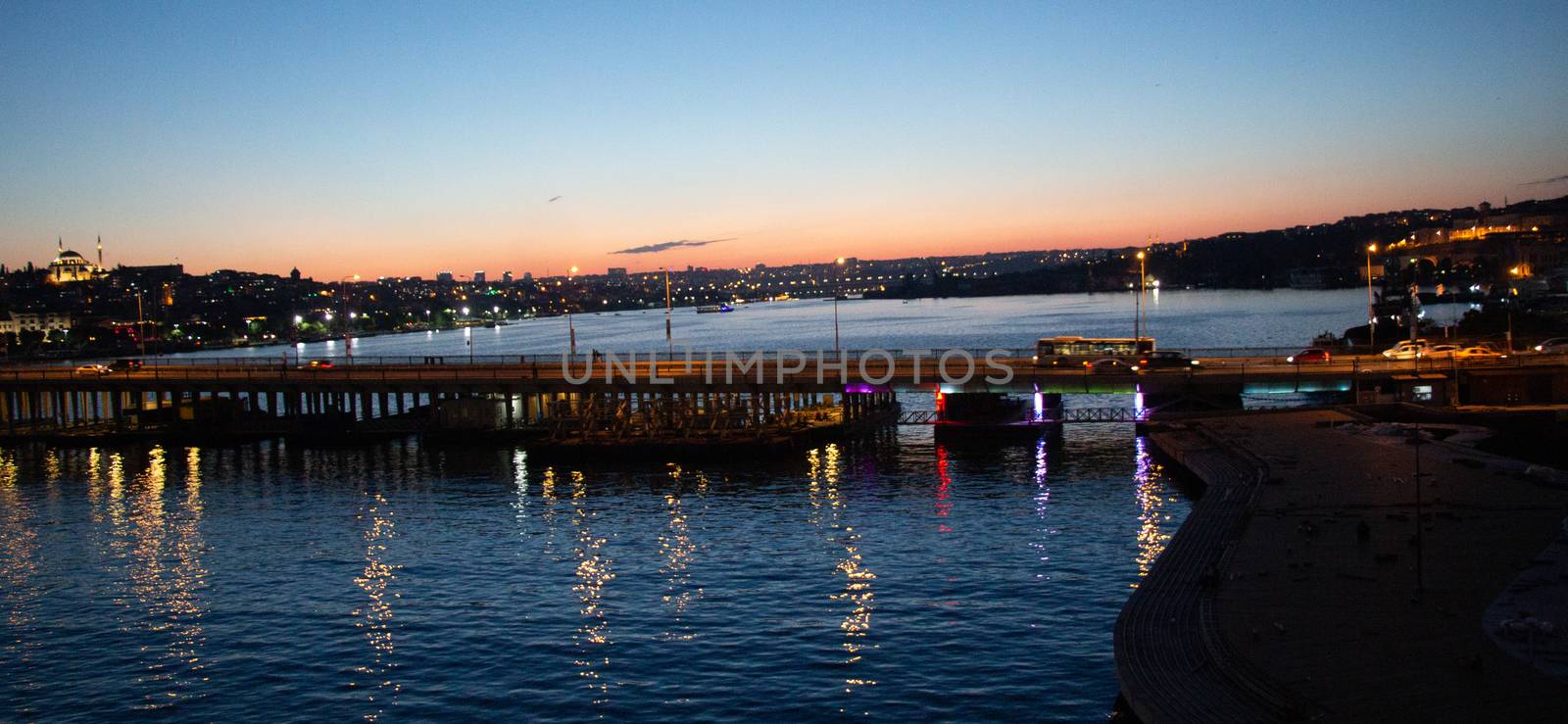 Ataturk bridge on Golden Horn at night on display