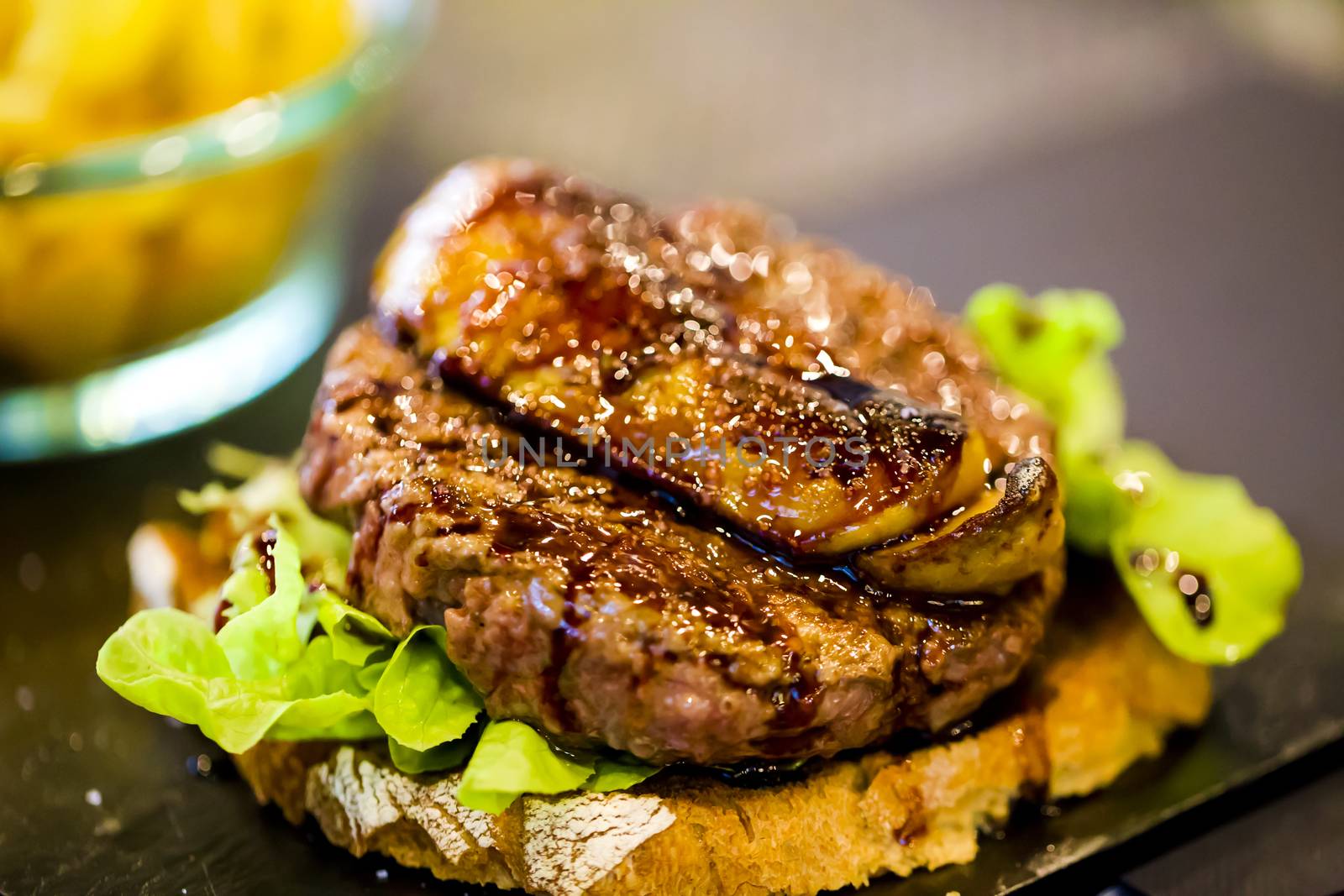 Appetizing juicy burger with grilled beef cutlet, macro