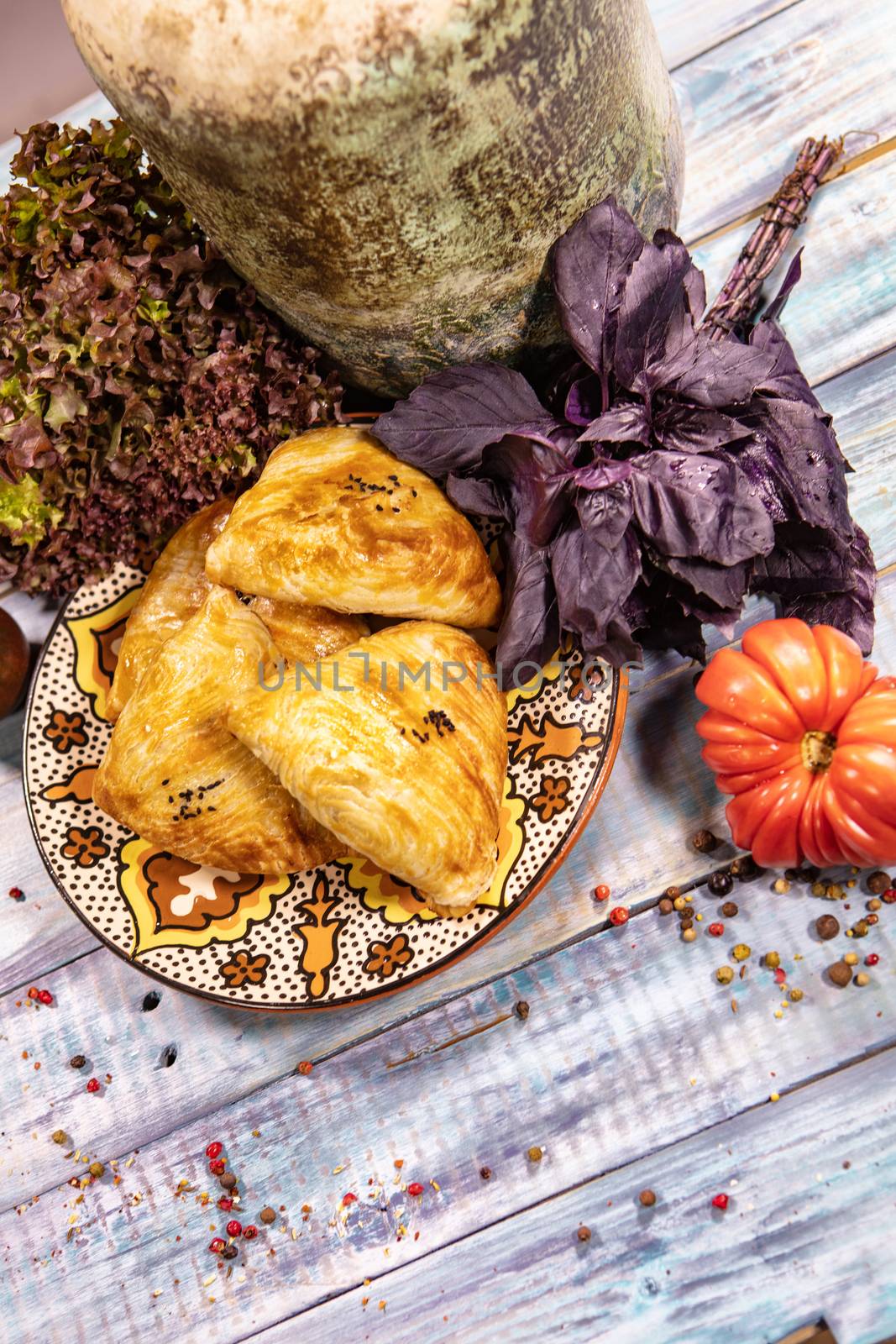 Traditional Asian food Samsa on an old wooden desk