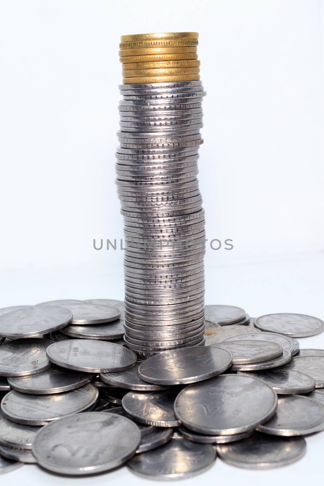 Stock pile of Hundred number 1, 10, 5 Indian rupee metal coin currency on isolated background. Financial, economy, investment concept. Banking and exchange object. by sudiptabhowmick