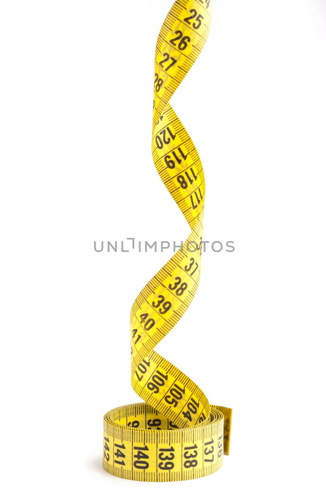 Yellow  measuring tape close-up isolated on white background