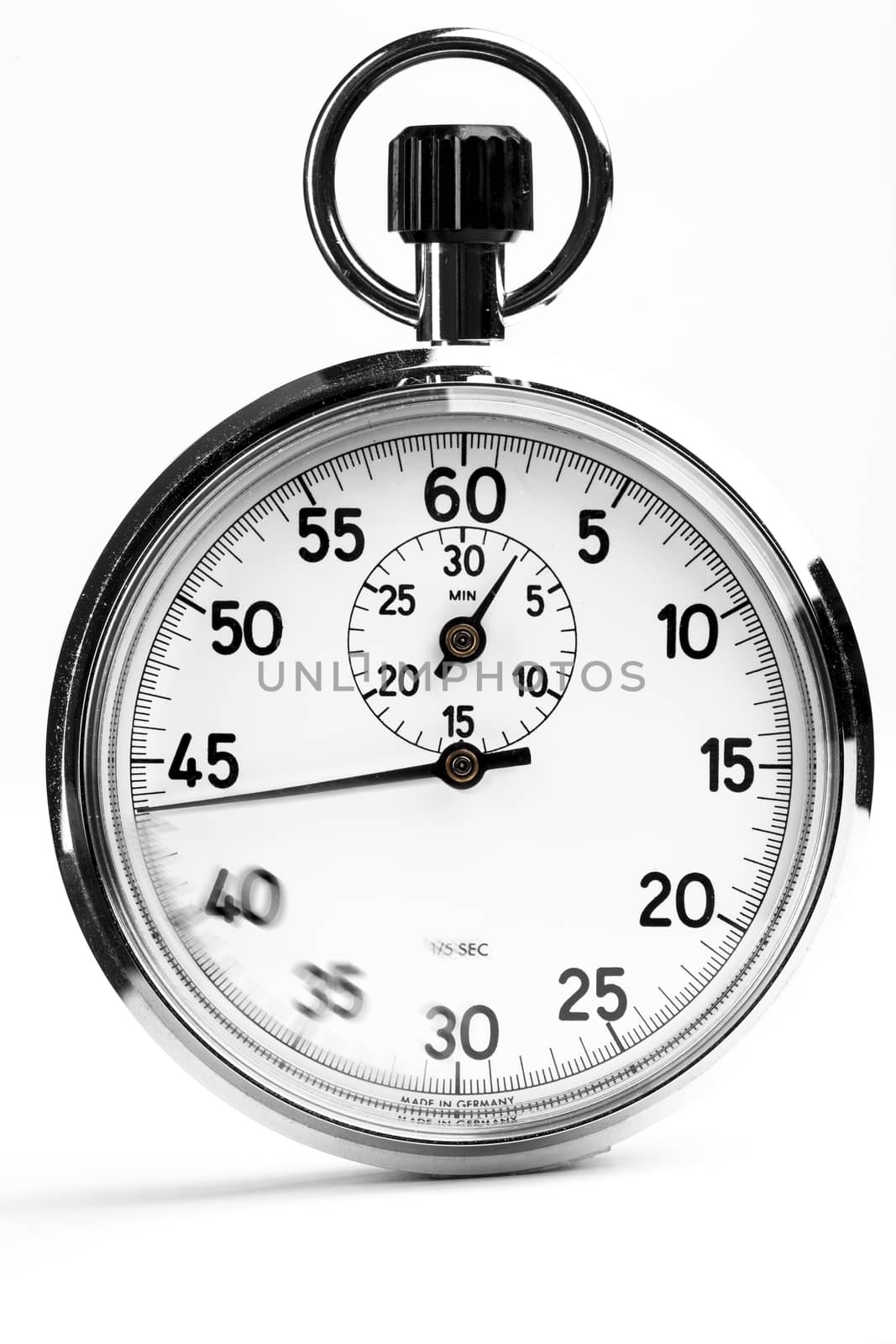 Silver analog stopwatch with motion on the dial isolated on white