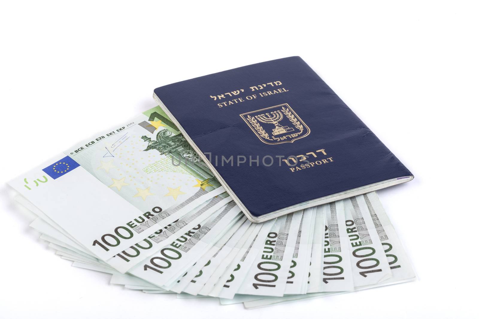 Israeli passport with 100 euro banknotes isolated on white background