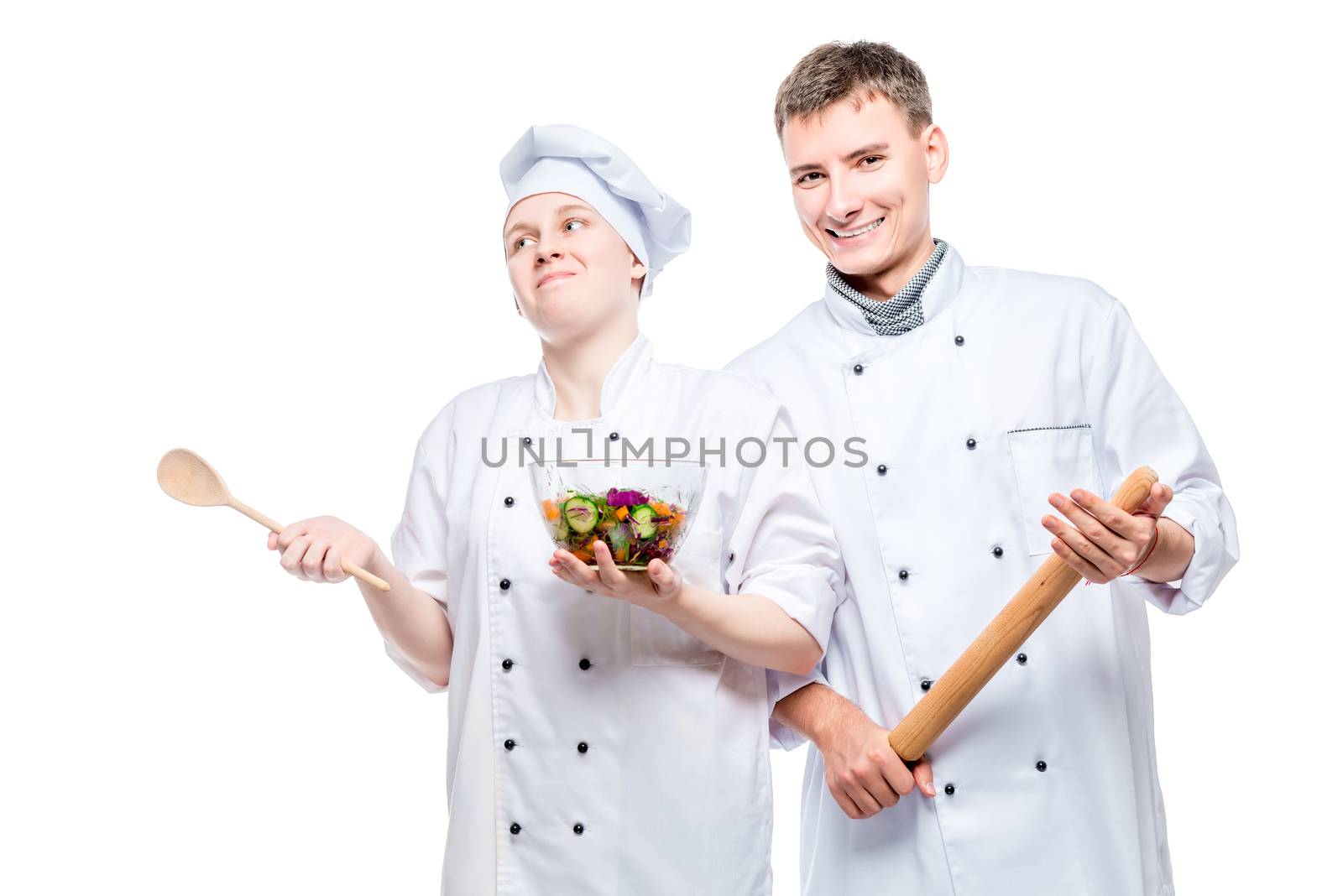 emotional young professional chefs with a dish on a white backgr by kosmsos111