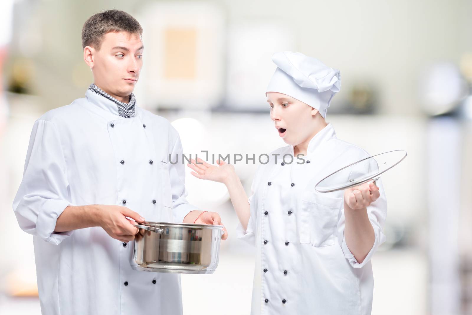 surprised cook looks at soup in a pan of another chef on the bac by kosmsos111