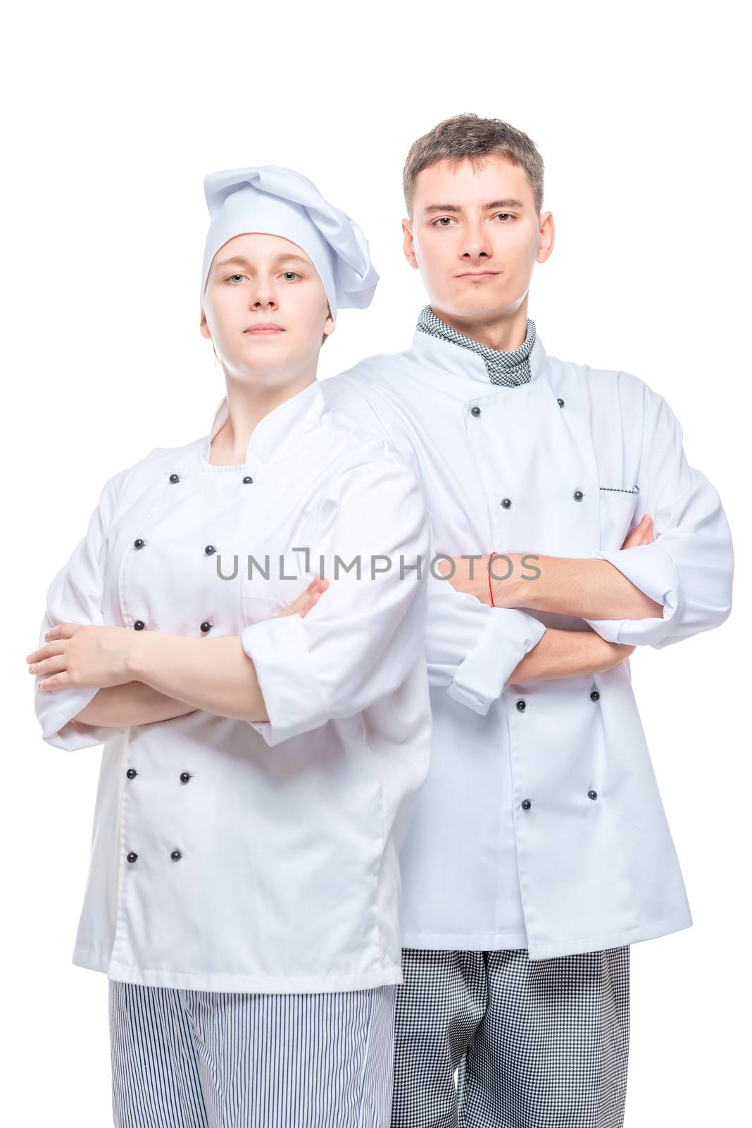 portrait of a successful team of professional chefs in suits against white background