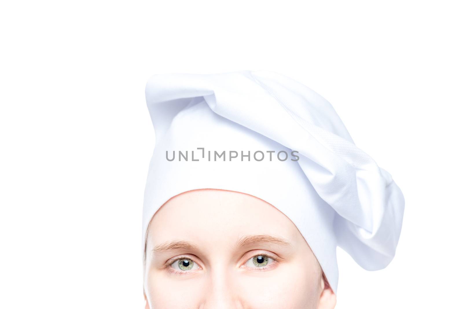 female chef's eyes with hat close up on white background