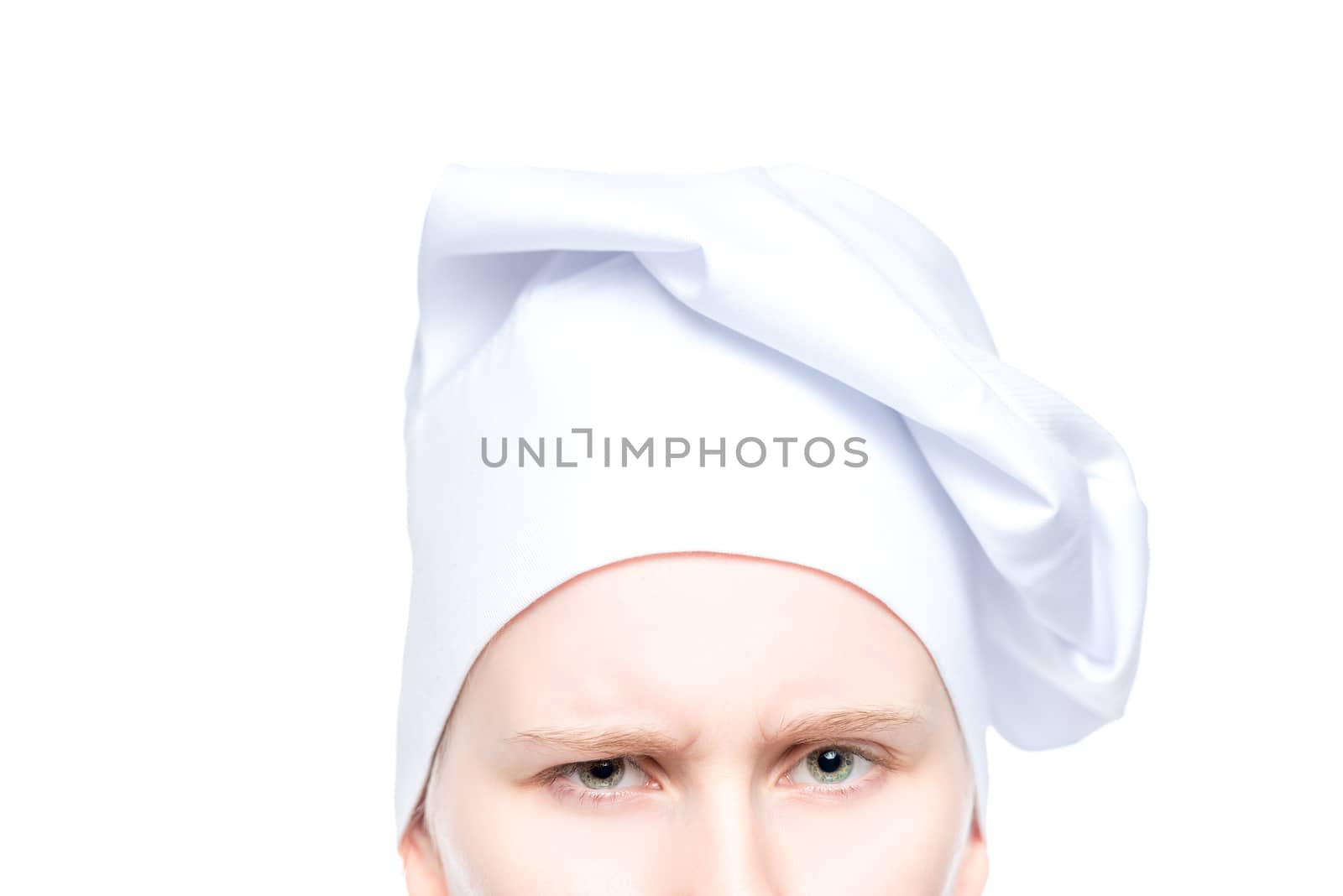 stern look cook in hat close up on white background