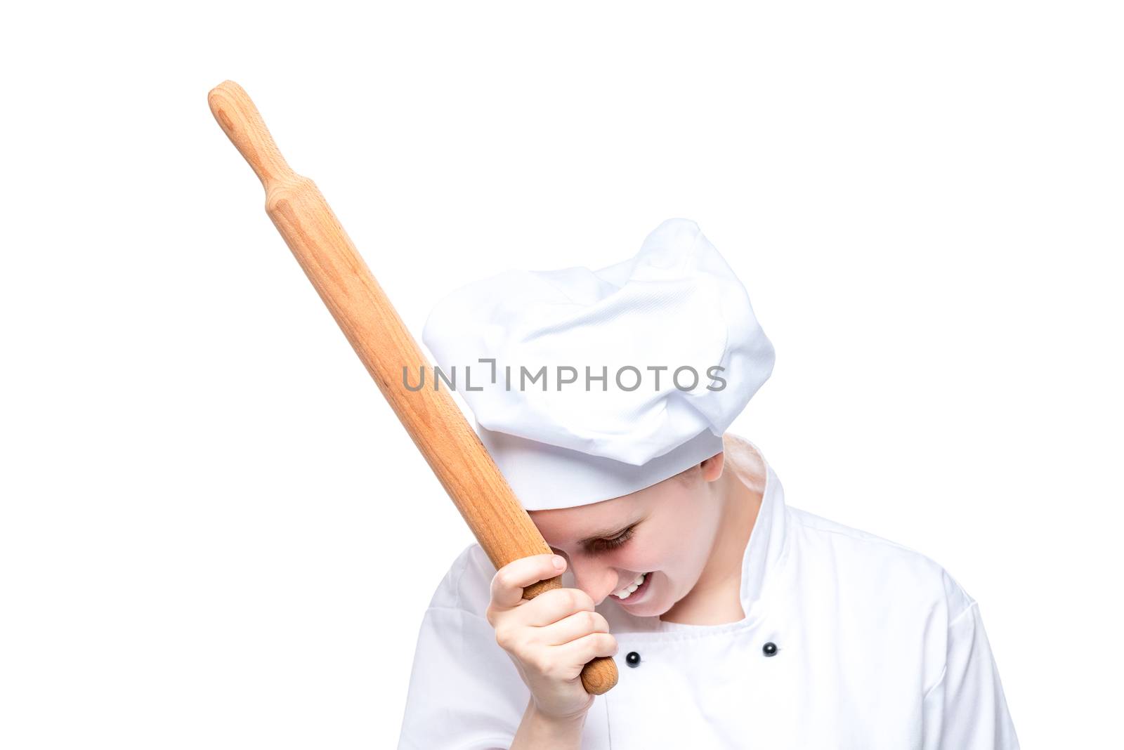laughing cheerful chef with a rolling pin posing on a white background, portrait isolated