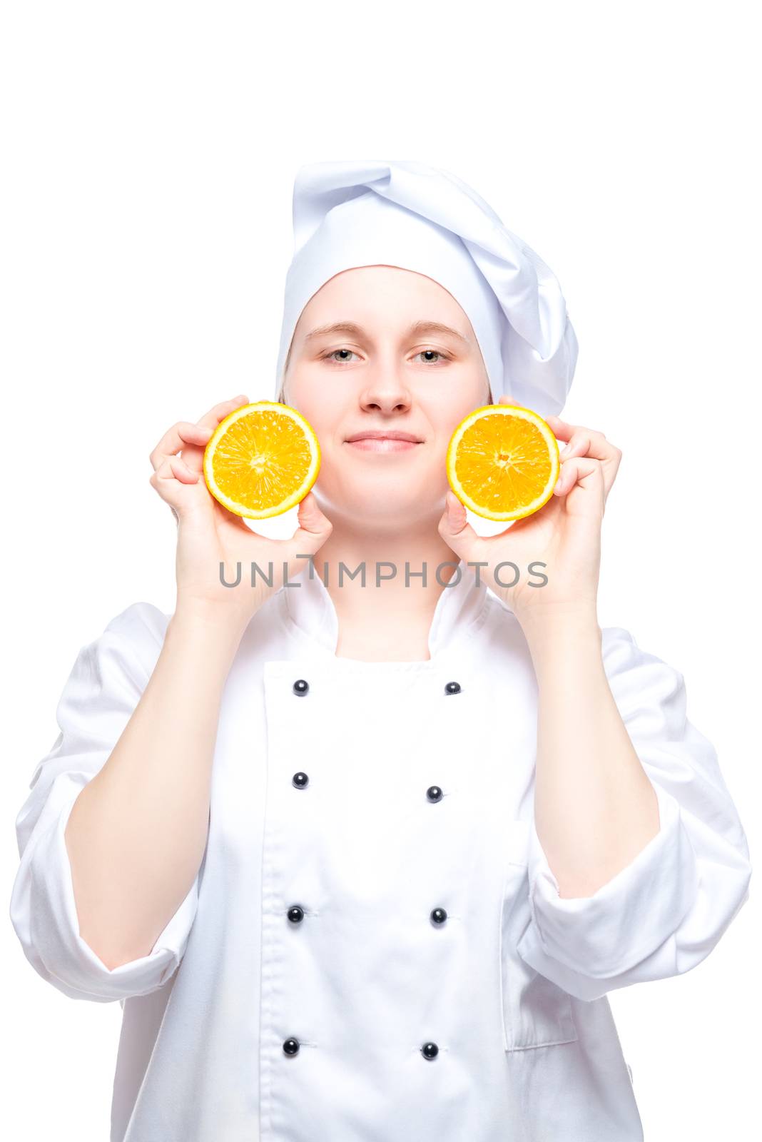 chef posing with oranges on a white background isolated