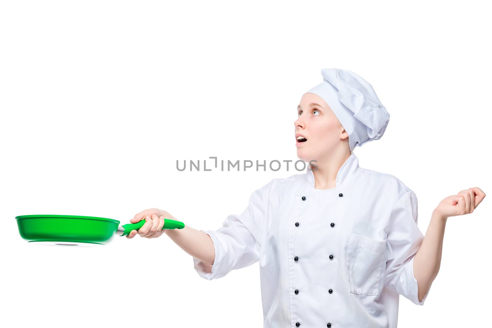 cook throws up food in a frying pan, emotional portrait on a white background