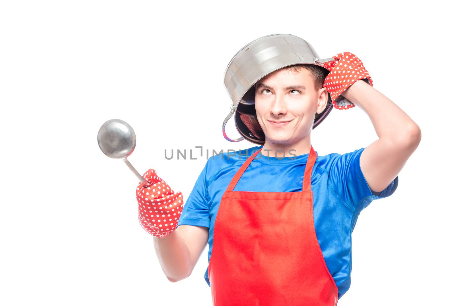 crazy man in a red apron put a pan on his head and posing on a w by kosmsos111