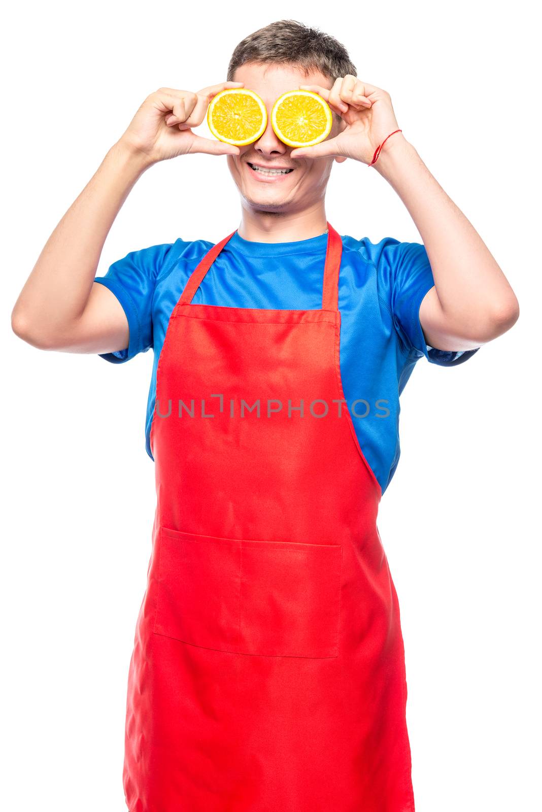 man in an apron fun photo with oranges on a white background by kosmsos111