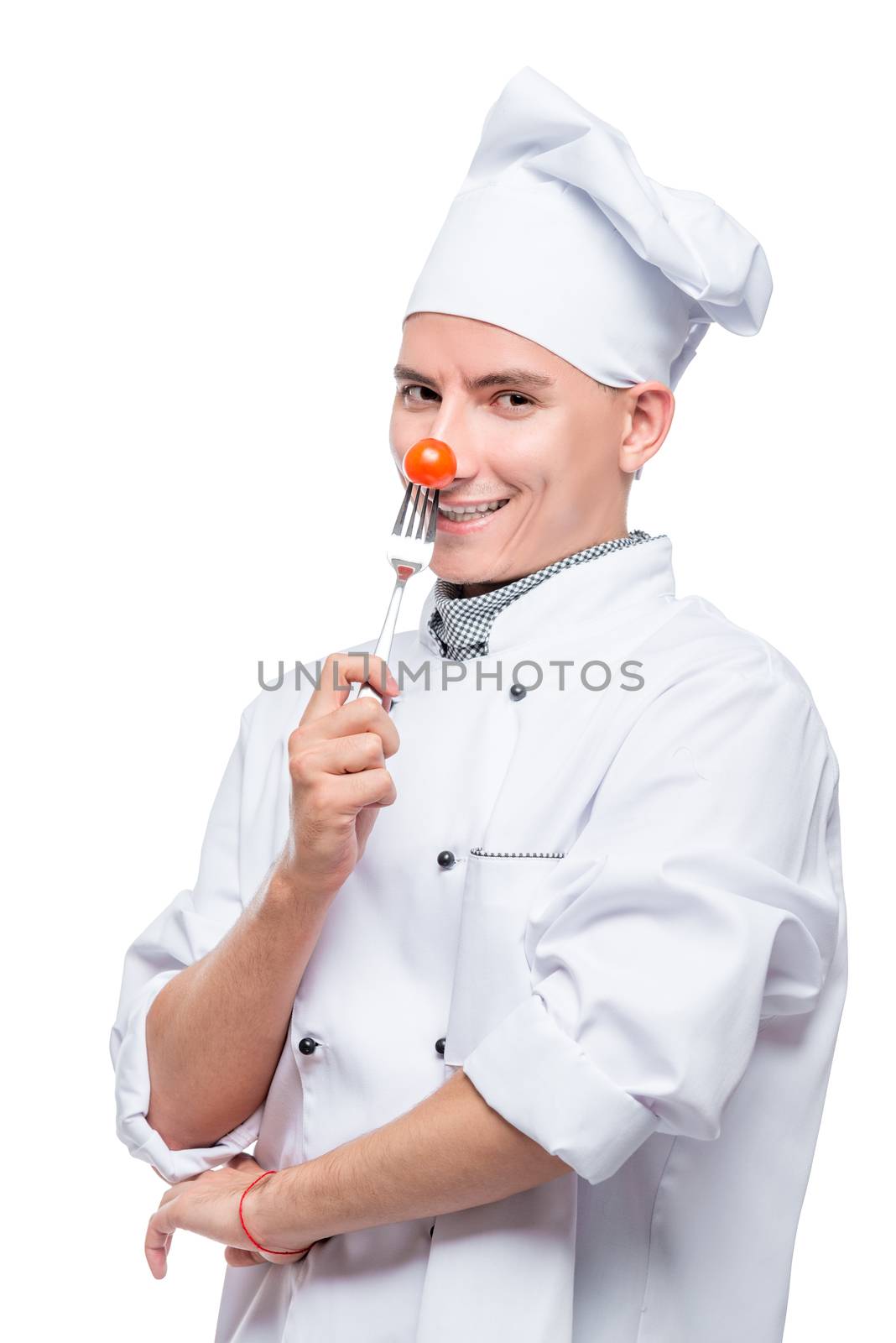 cooks with cherry tomato on a fork, shot on a white background i by kosmsos111