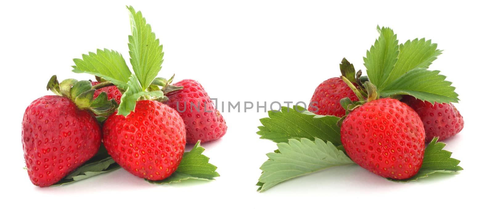 Set of piles of strawberry berries with leaves isolated on white background