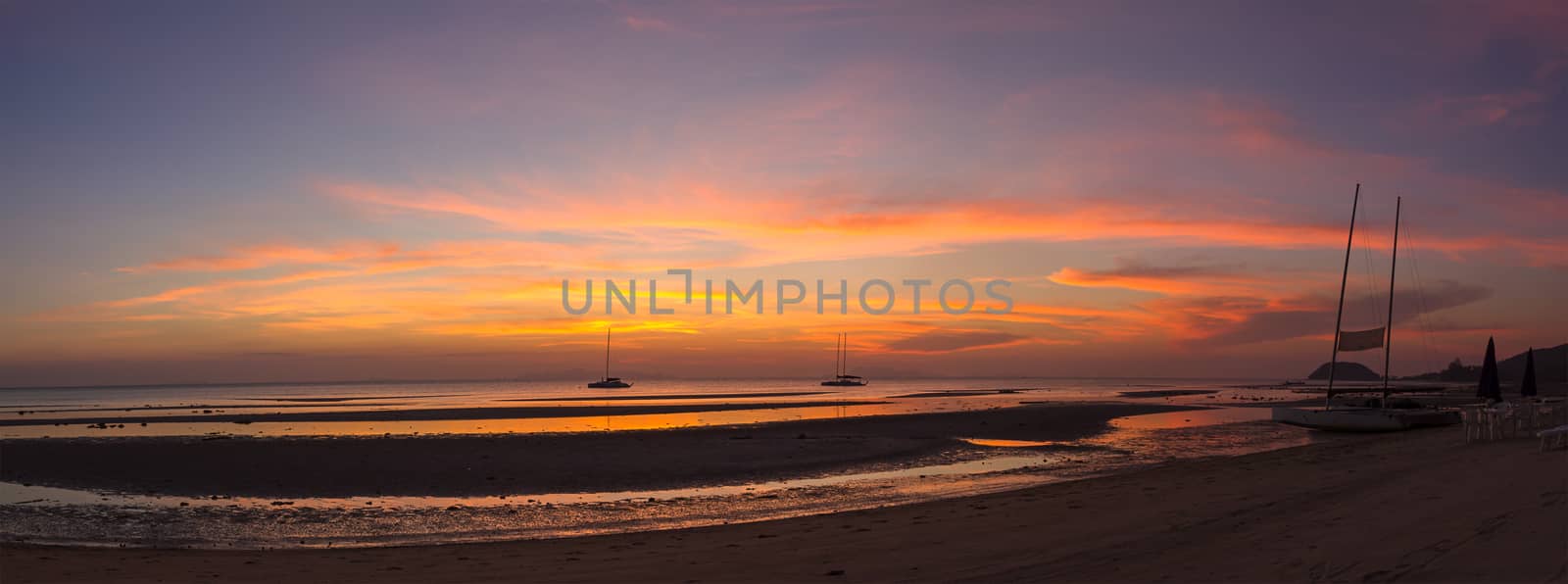 Colorful panorama sky during sunset in the twighligth sky over sea at seashore