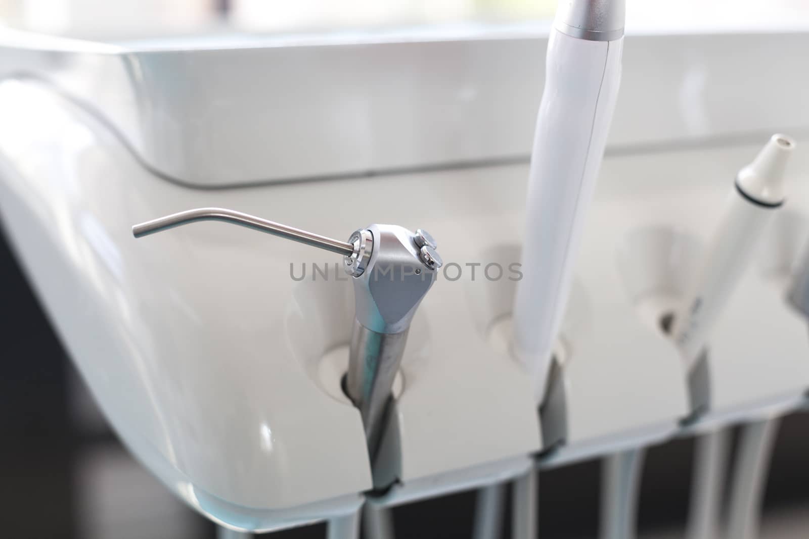 Dentist chair tools closeup on the dryer