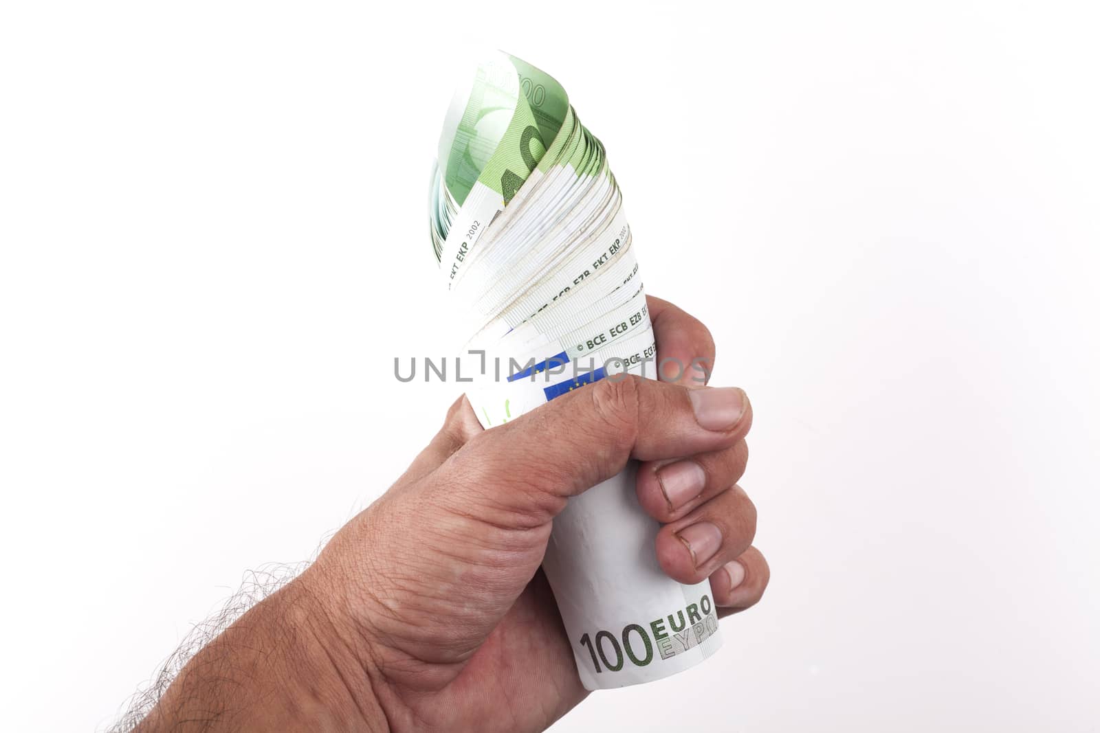 Man hand holding a roll of hundred euro banknotes isolated on white background