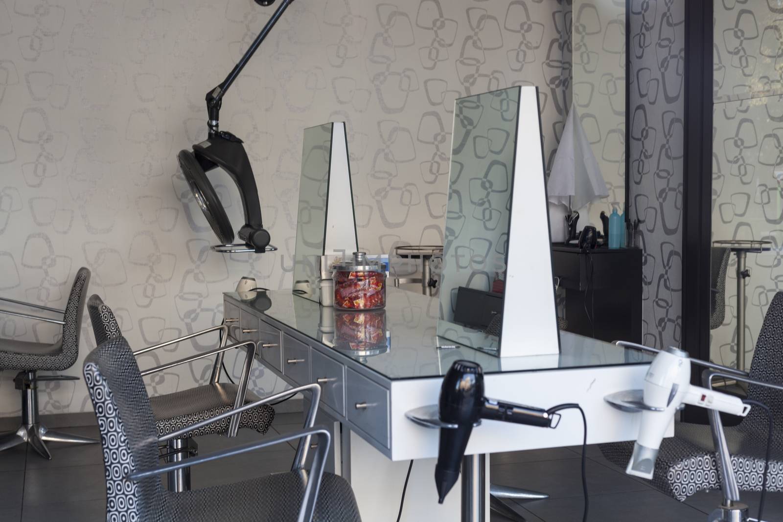 Barber shop salon with seats and mirrors