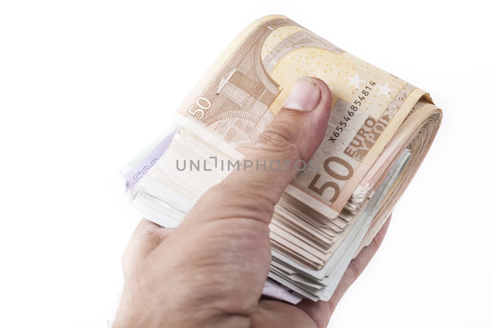 Man hand holding a bunch of euro banknotes isolated on white background