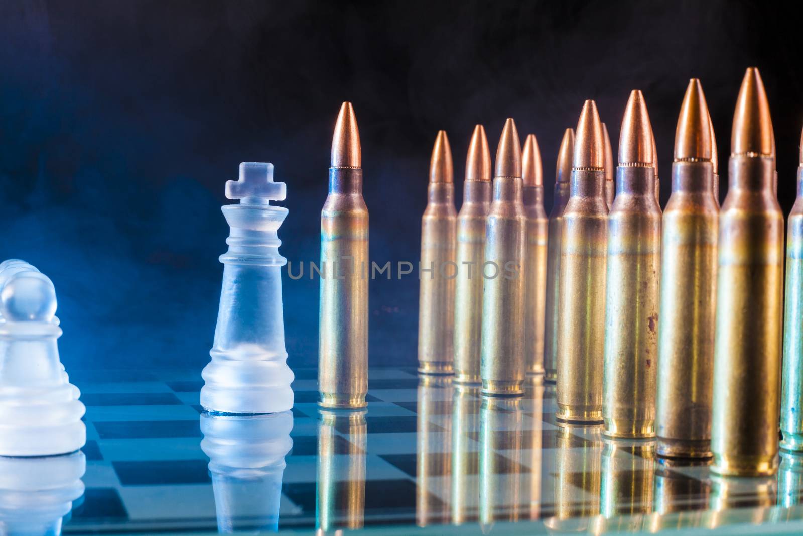 Confruntation bewteen chess kink and a bullet with blue smoke in the background