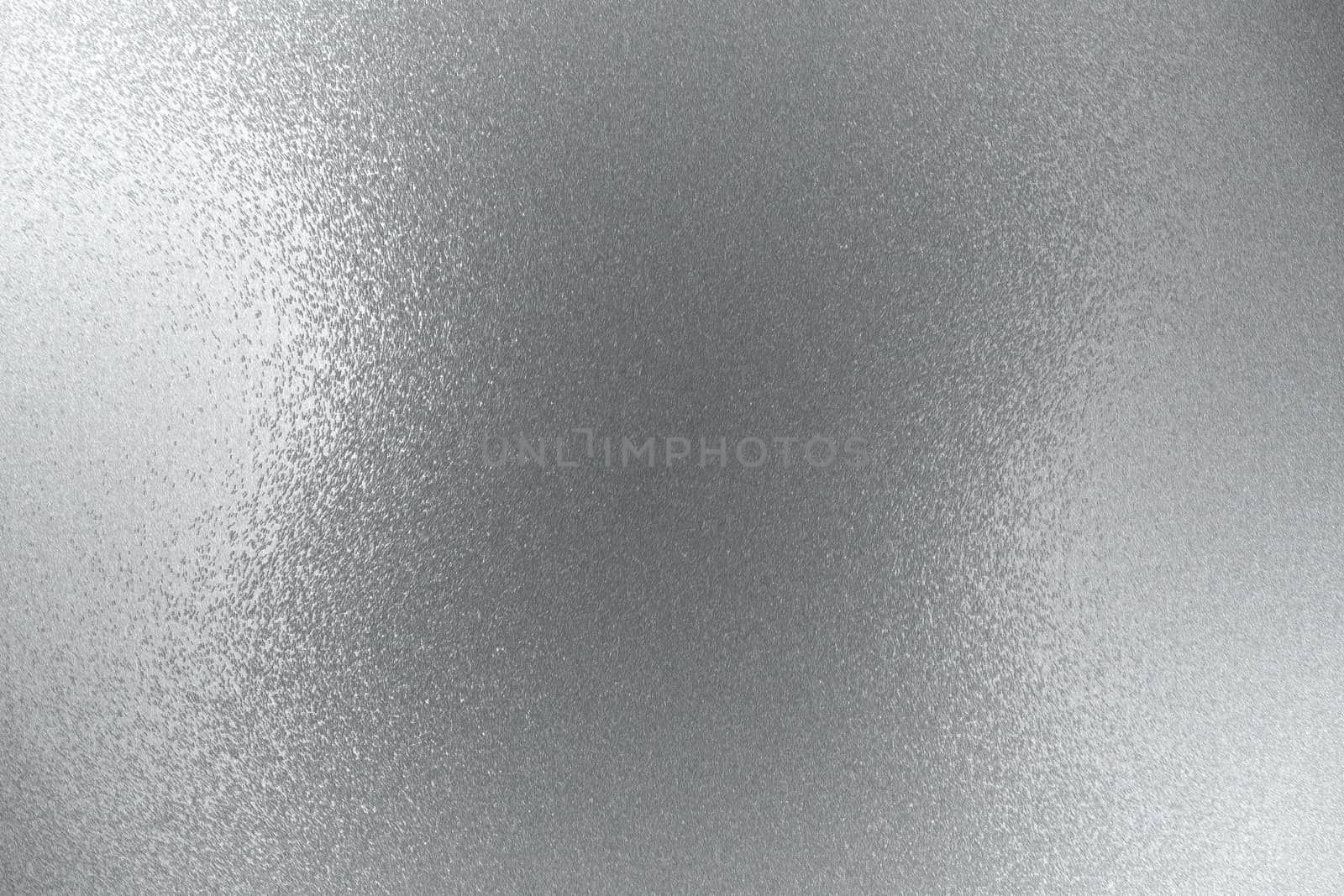 Reflection on rough silver sheet surfaces, abstract background