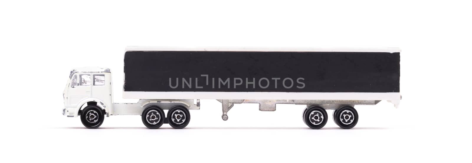 White metal toy truck, isolated on white