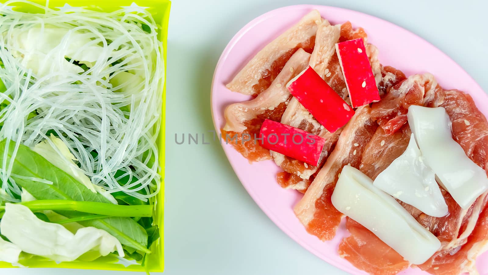 top view raw pork on plate  isolated on white background