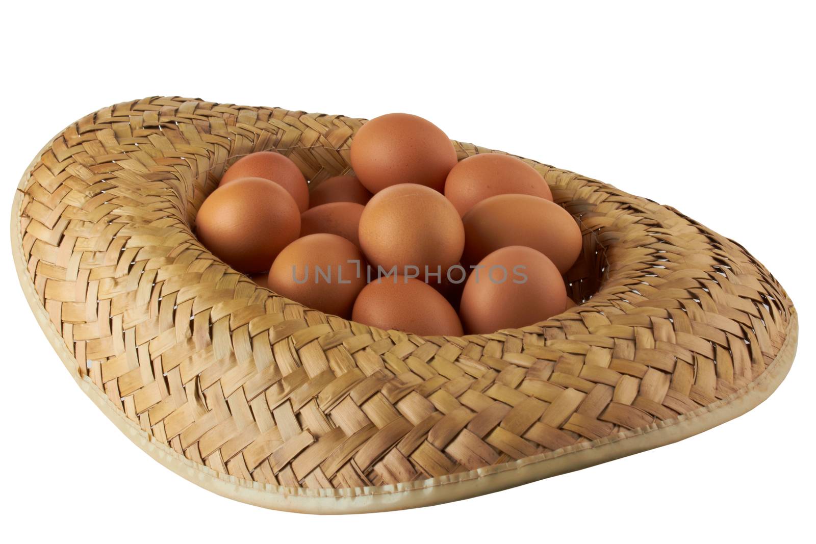Eggs in a hat is isolated over a white background 