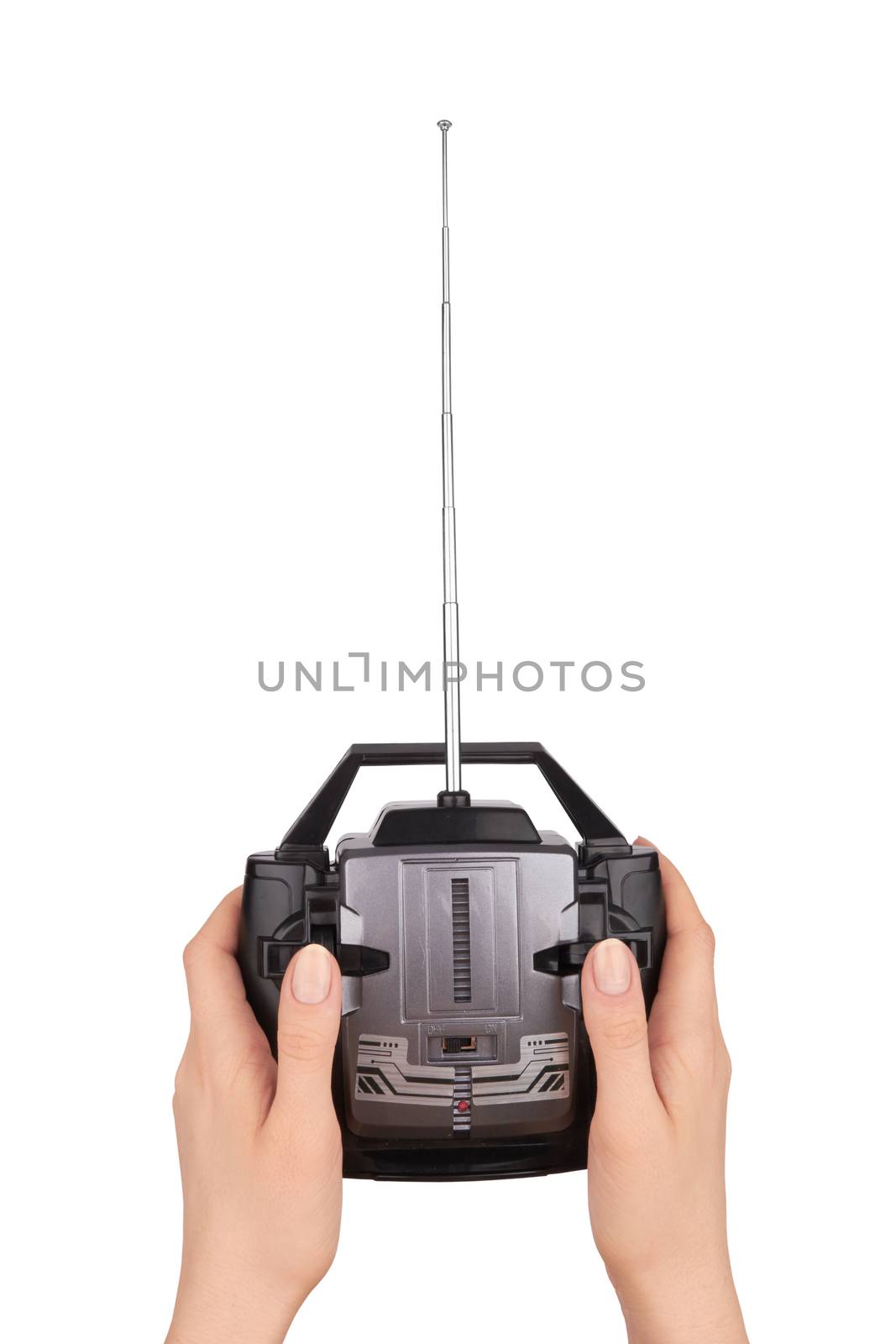 Radio remote control for toy car in hand isolated on white 