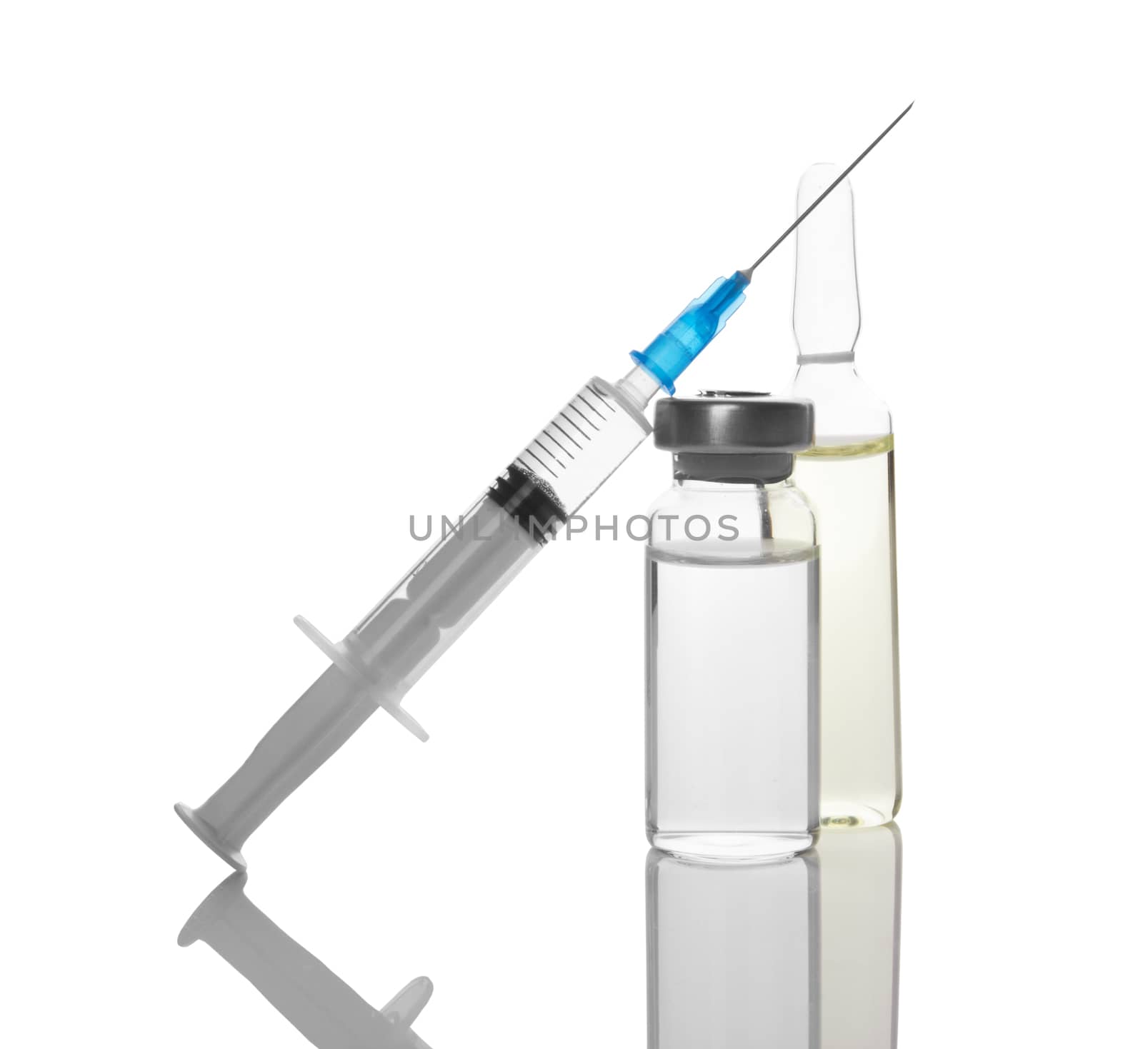 Ampules and syringe isolated on white background 