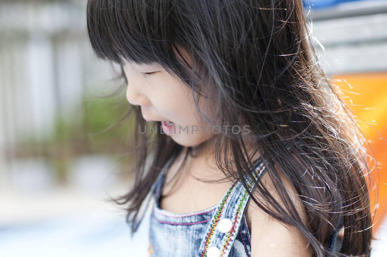  little Asian girl in playground. by szefei