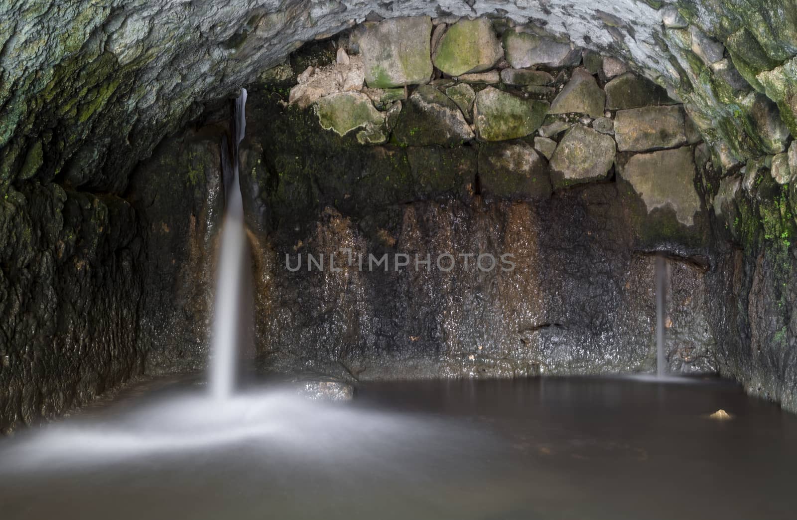 Ancient Roman Water mill inside stream 