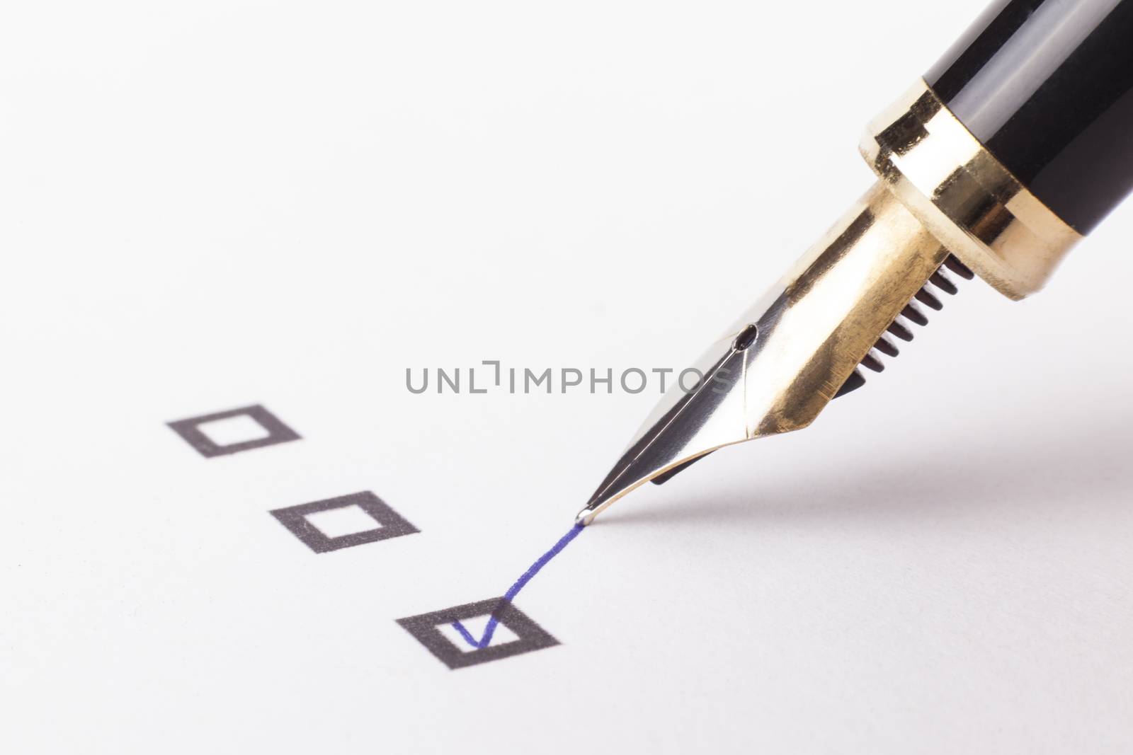 Choosing one of many rectangles with blue foutain pen checklist close-up on white paper