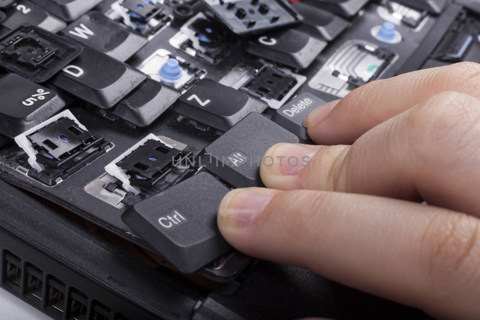 Fingers on alt crtl delete keys on broken laptop keyboard