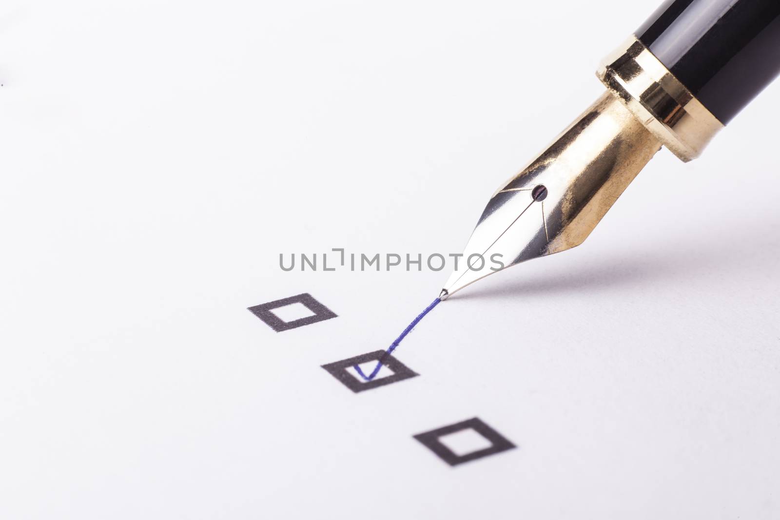 Checklist with the second option checked and a foutain pen on white page