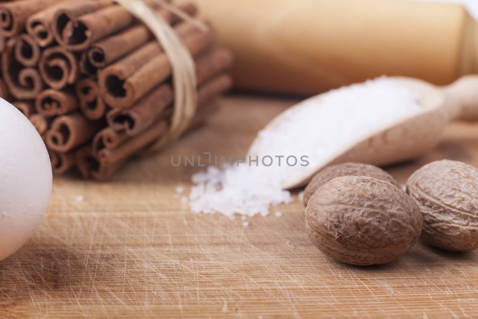 Baking ingredients close-up on brown wod board