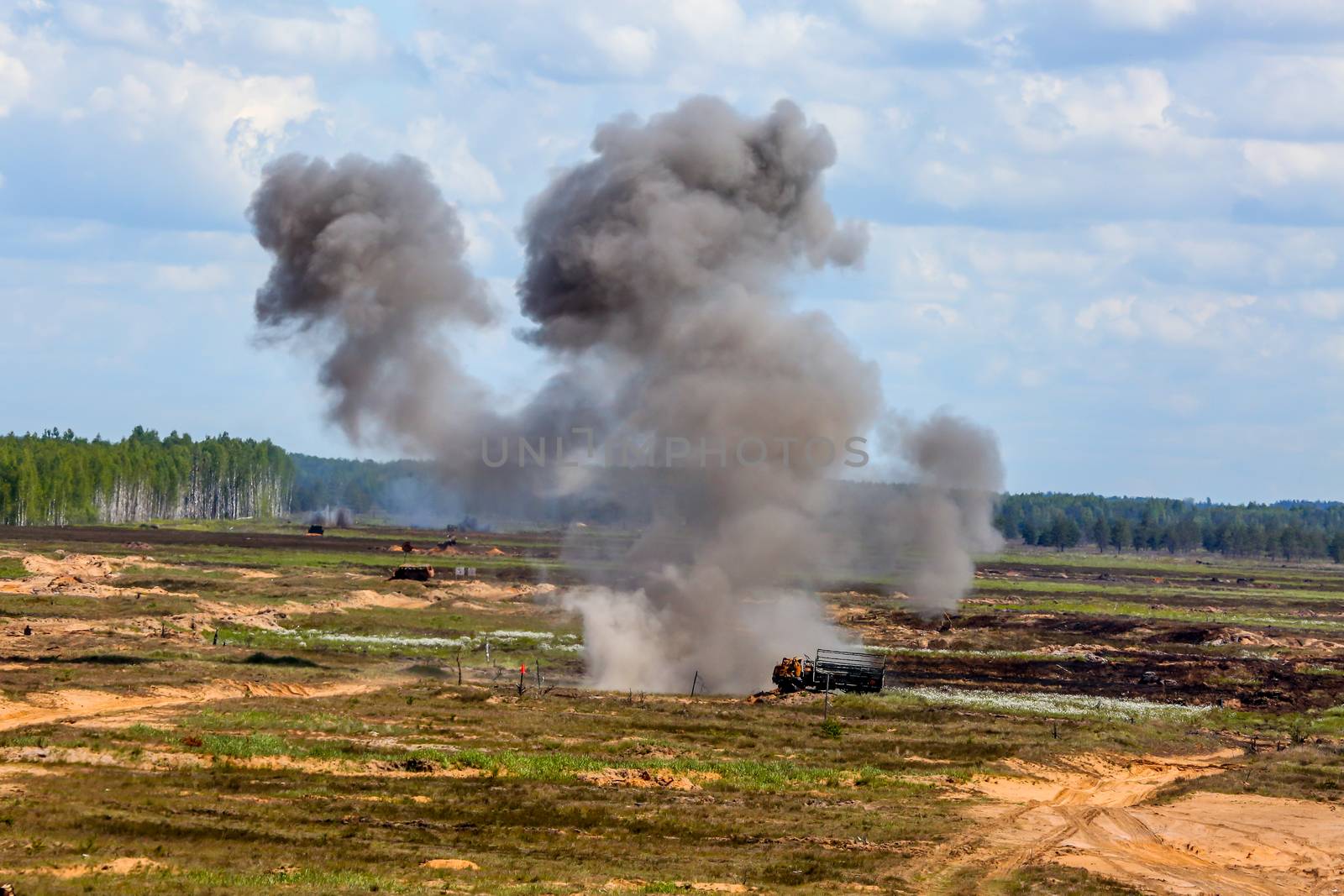 Explosion and smoke. International Military Training "Saber Strike 2017", Adazi, Latvia, from 3 to 15 June 2017. US Army Europe-led annual International military exercise Saber Strike Field Training Exercise in Latvia.
