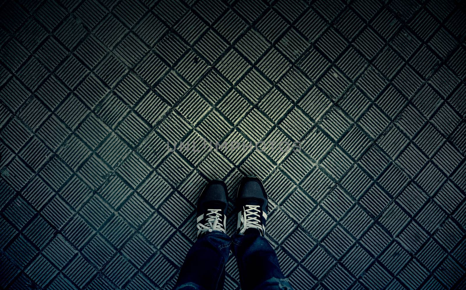 Feet with boots, urban fashion detail
