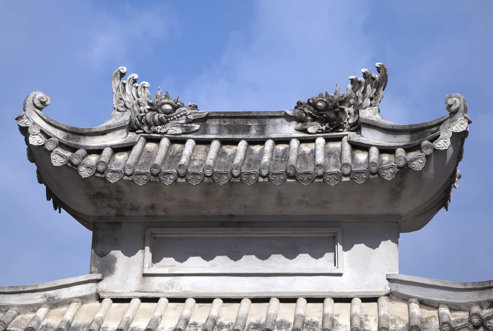 Ceramic decoration on a temple roof in Vietnam